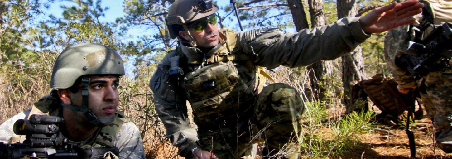A Special Forces Soldier provides instruction on field operations.