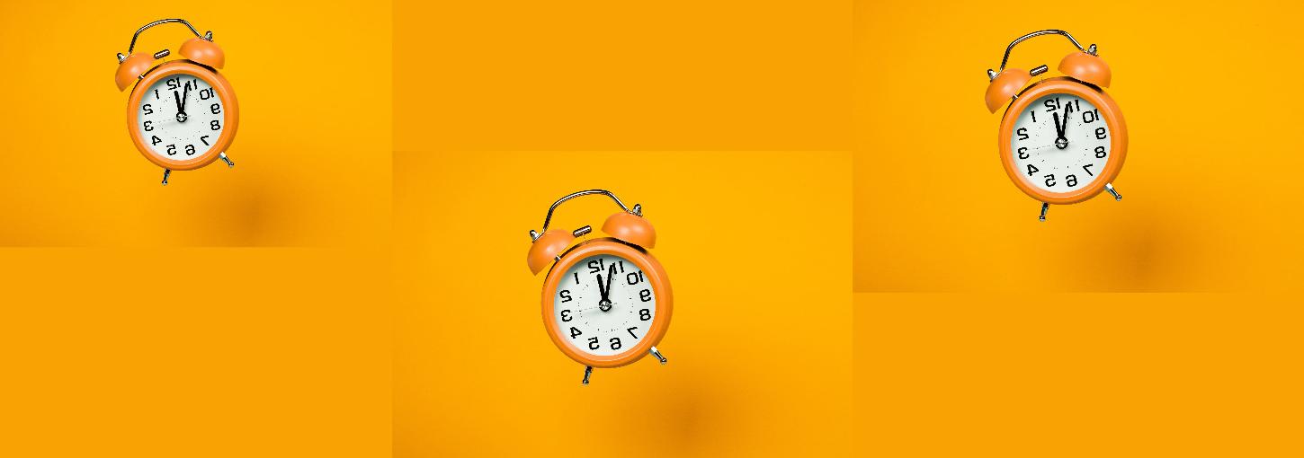 Alarm clock, orange background